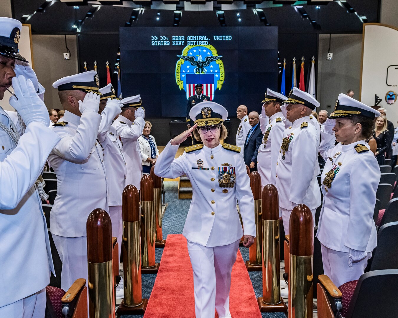 Woman saluting.