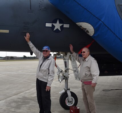 Attendees pose with an F-15E Strike Eagle during the 33rd annual Retire Appreciation Day ceremony at Royal Air Force Lakenheath, England, Sept. 6, 2019. Attendees had the opportunity to view aircraft static displays and a munitions demonstration. (U.S. Air Force photo by Airman 1st Class Rhonda Smith)