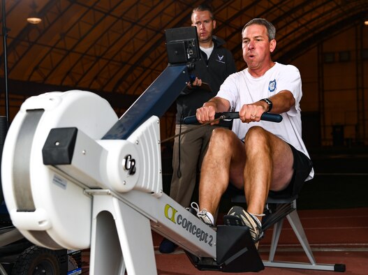 Theodore Koch, with the Air Force Tactical Exploitation of National Capabilities, competes on the rowing machine during the DriTri Fitness Competition on Sept. 6, 2019, at Schriever Air Force Base, Colorado.
