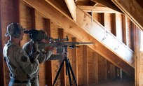 A sniper team from Illinois National Guard’s 2nd Battalion, 130th Infantry Regiment sniper team aims to fire during Rising Thunder 19.