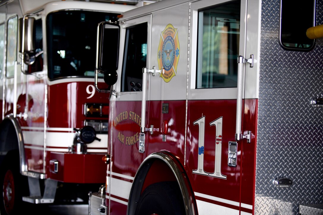 Firetrucks 9 and 11 sit at the back of the 9/11 Remembrance Ceremony at Seymour Johnson Air Force Base, North Carolina, Sept. 11, 2019.