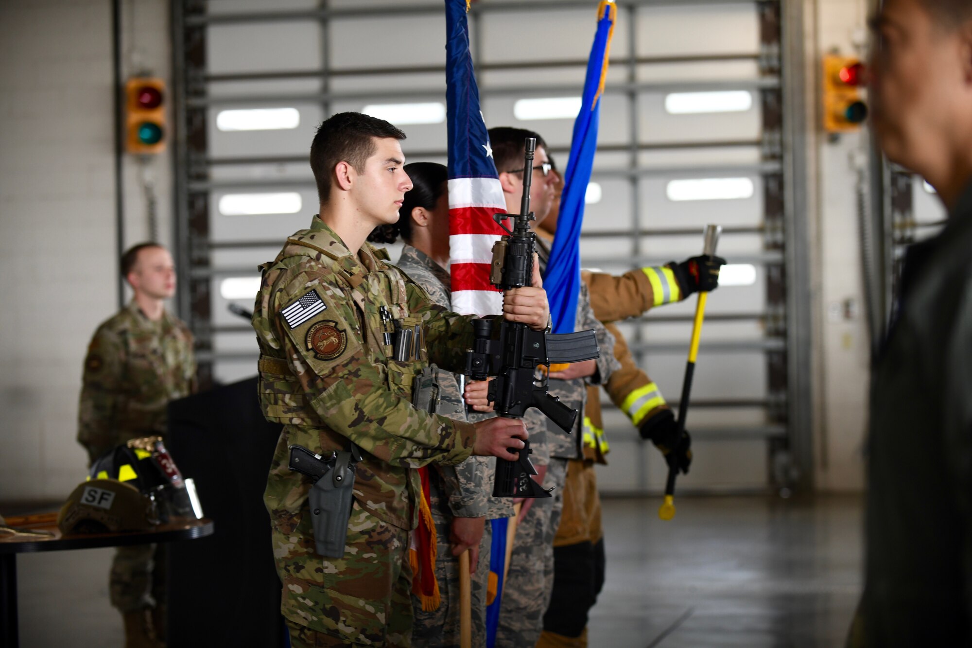 An honor guard, consisting of defenders and firefighter from the 4th Fighter Wing, present the colors during the opening of the 9/11 Remembrance Ceremony at Seymour Johnson Air Force Base, North Carolina, Sept. 11, 2019.