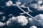 A U.S. Air Force MQ-9 Reaper flies during RED FLAG-Alaska 19-2, June 19, 2019, at Eielson Air Force Base, Alaska. This is the first time the MQ-9 aircraft participated in the Pacific Air Forces-sponsored exercise.