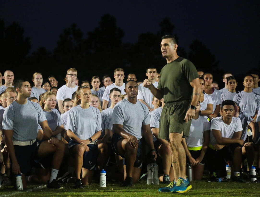 U.S. Marine Corps Master Gunnery Sgt. Blaine Jones, U.S. Central Command’s senior enlisted advisor to the joint operations directorate, addresses a group of Reserve Officers' Training Corps (ROTC) cadets on the importance of military service following a group run at the University of South Florida (USF) campus, Sept. 11, 2019. This annual Patriot Day joint run is an opportunity for all USF ROTC units to come together and build camaraderie as a group while remembering those who lost their lives on 9/11. (U.S. Central Command Public Affairs photo by Tom Gagnier)
