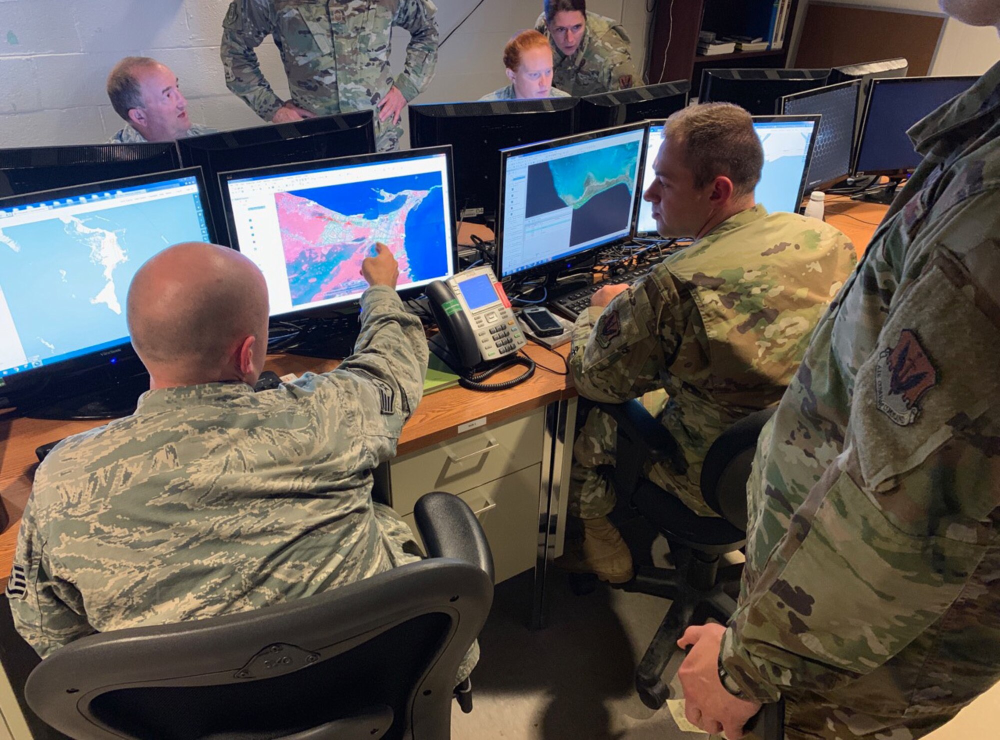 U.S. Air Force Airmen from the 118th Wing, Tennessee Air National Guard use their imagery analysis skills to assess damage in the Bahamas from Hurricane Dorian Sept. 6, 2019 at Berry Field Air National Guard Base, Nashville, Tenn. The products produced by the Airmen are sent to higher headquarters, who then use them to more effectively direct first responders on the ground. (U.S. Air National Guard photo by Master Sgt. Jeremy Cornelius)