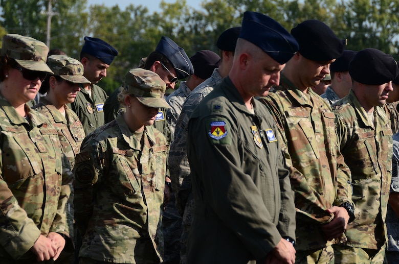 Members of the 445th Airlift Wing pause for a moment of silence, Sept. 11, 2019 at 10:03 a.m. as they honor Maj. LeRoy Homer, First Officer on United Airlines Flight 93 that crashed in Shanksville, Pa. at 10:03 a.m. Sept. 11, 2001. Homer was a member of the 445th Airlift Wing’s 356th Airlift Squadron from 1995 to 2000.