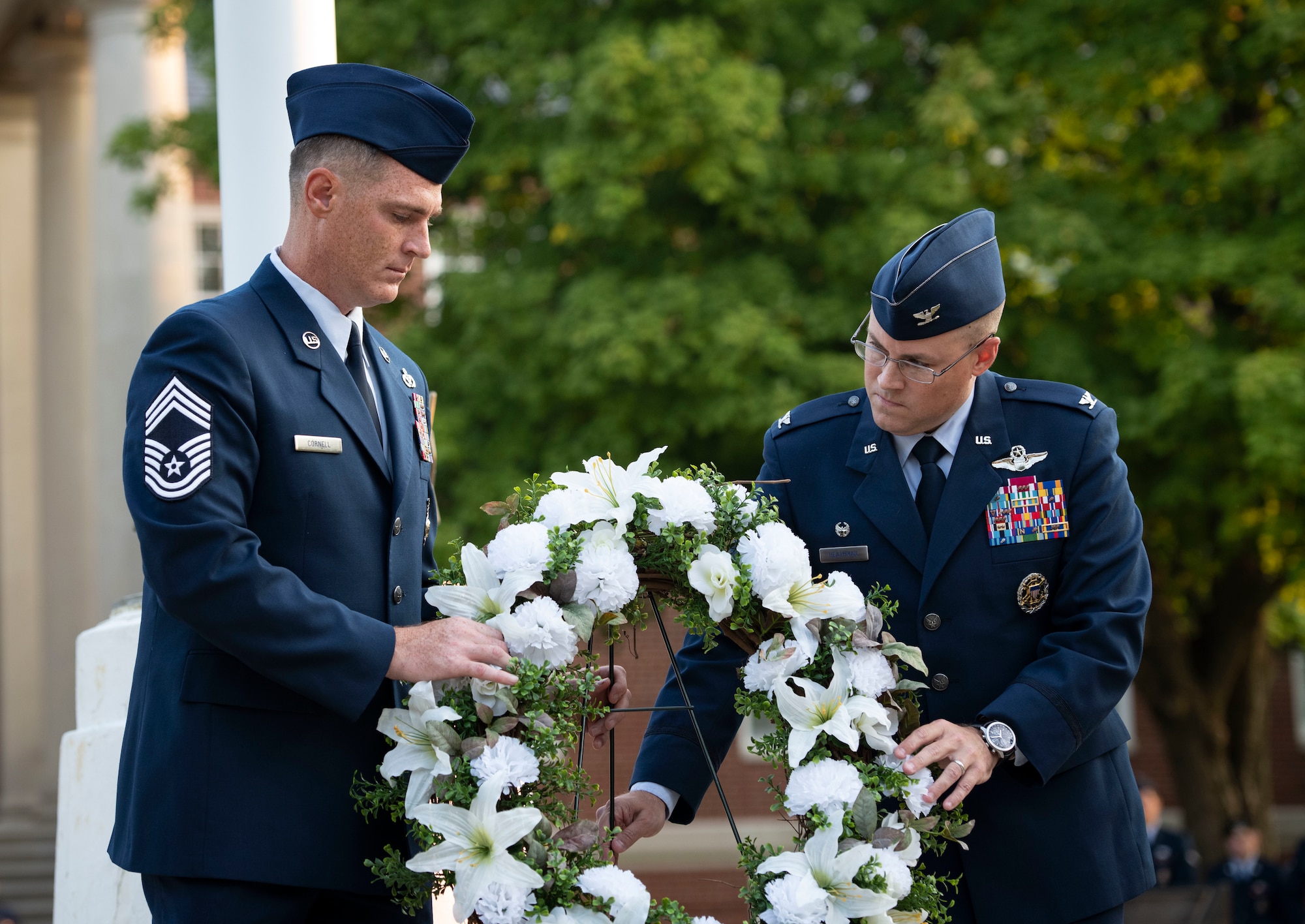 Airmen carry wreath