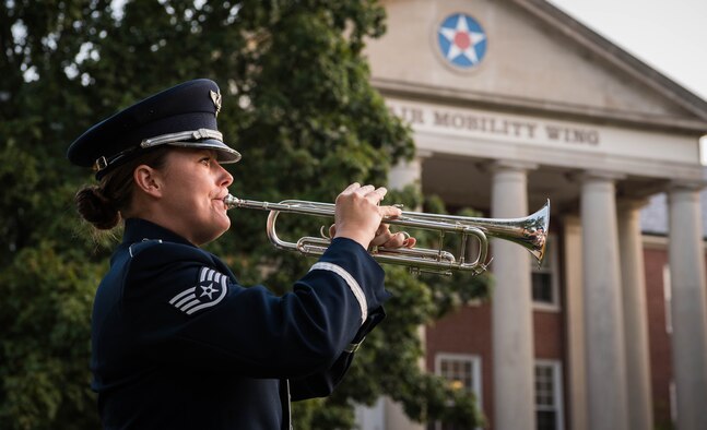 Staff. Sgt. plays taps