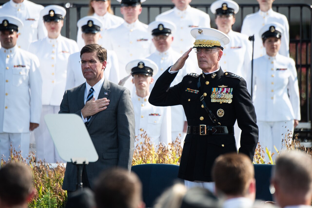 Defense Secretary Dr. Mark T. Esper and Marine Corps Gen. Joe Dunford, chairman of the Joint Chiefs of Staff, stand next to each other.