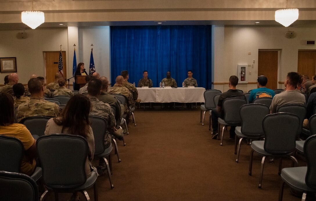 Senior Master Sgt. Cody Stollings, 790th Missile Security Forces Squadron operations superintendent, Tech. Sgt. Robert Gerard, 90th Security Forces Squadron commander support staff, and Airman Alfonso Santiago, 90th Medical Group medical technician, sit on a panel for a story telling event Sept. 10 2019, at F.E. Warren Air Force Base, Wyo. The event was hosted on Suicide Prevention Day and aimed to raise awareness about suicide prevention. (U.S. Air Force photo by Senior Airman Abbigayle Williams)