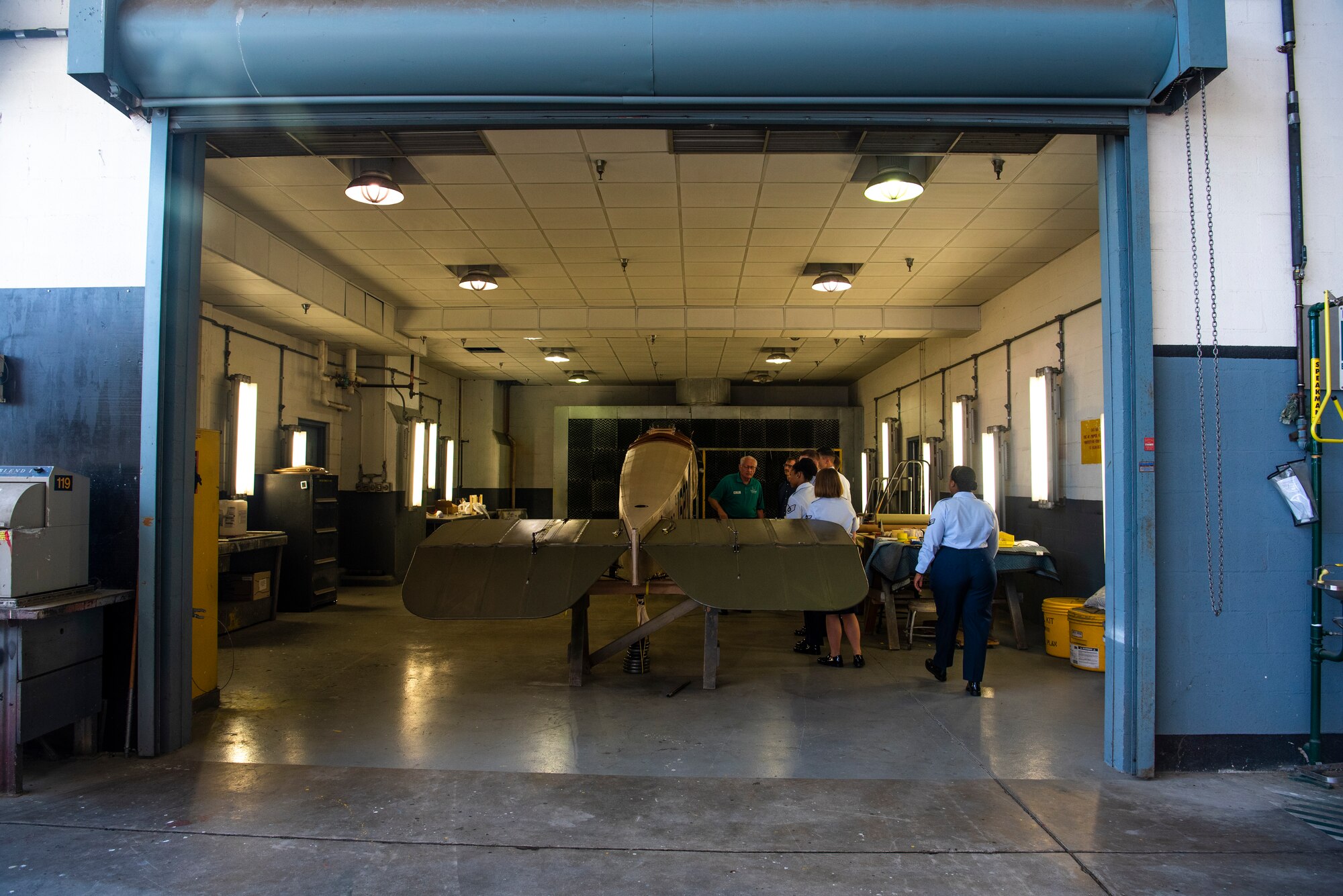 During a tour of The National Museum of the U.S. Air Force, Airmen from the 90th Missile Wing visited the restoration hangar, viewing aircraft and artifacts being repaired before placement in the museum. The restoration hangar reviews every item donated to the museum and makes the necessary repairs. (U.S. Air Force photo by Senior Airman Abbigayle Williams)