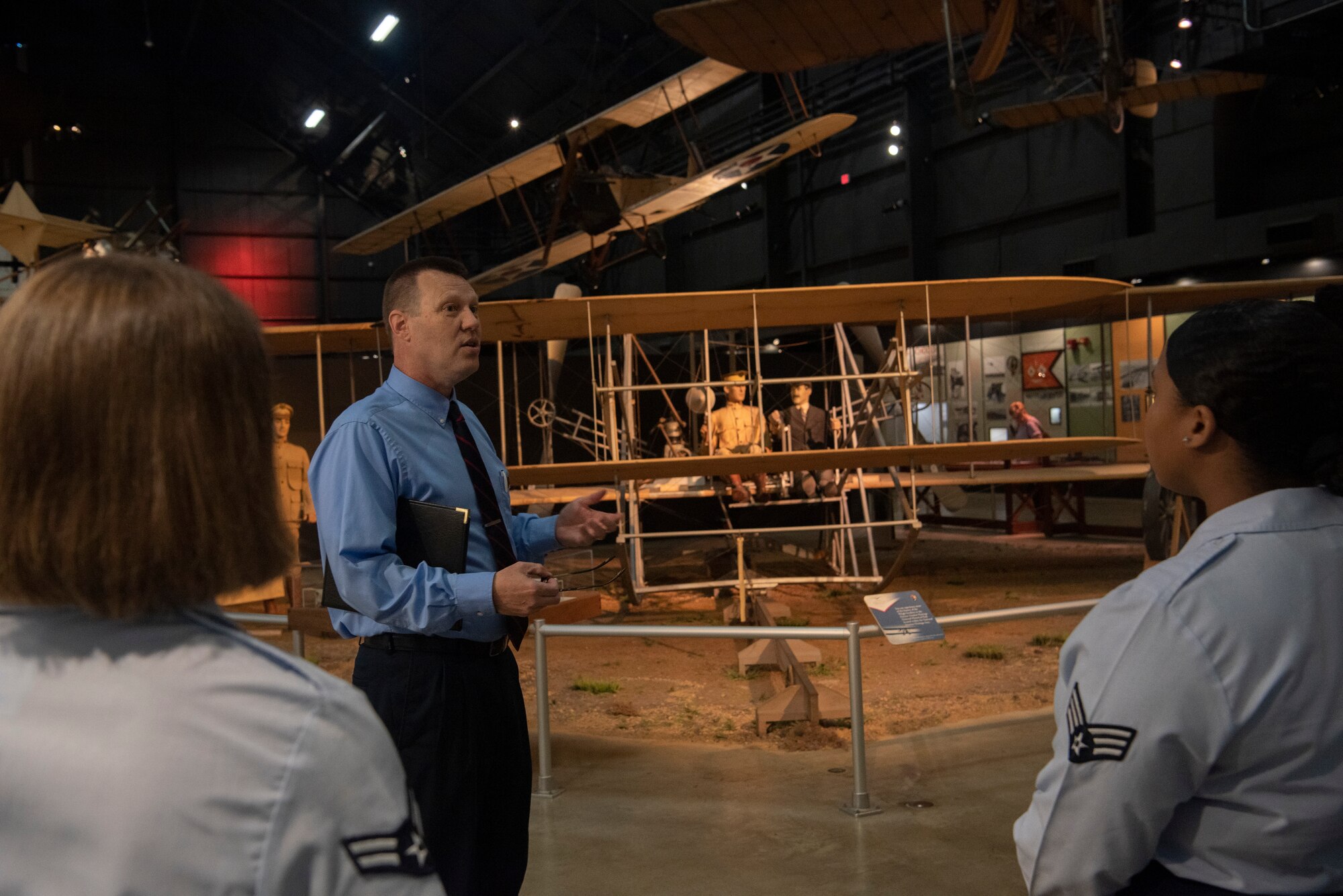 Dr. Doug Lantry, The National Museum of the U.S. Air Force historian, gives Airmen from the 90th Missile Wing a tour of the museum during their heritage and teamwork trip Sept. 4, 2019, at Wright-Patterson Air Force Base, Ohio. The trip allowed Airmen to receive a greater insite into the history of the ICBM history and air power. (U.S. Air Force photo by Senior Airman Abbigayle Williams)