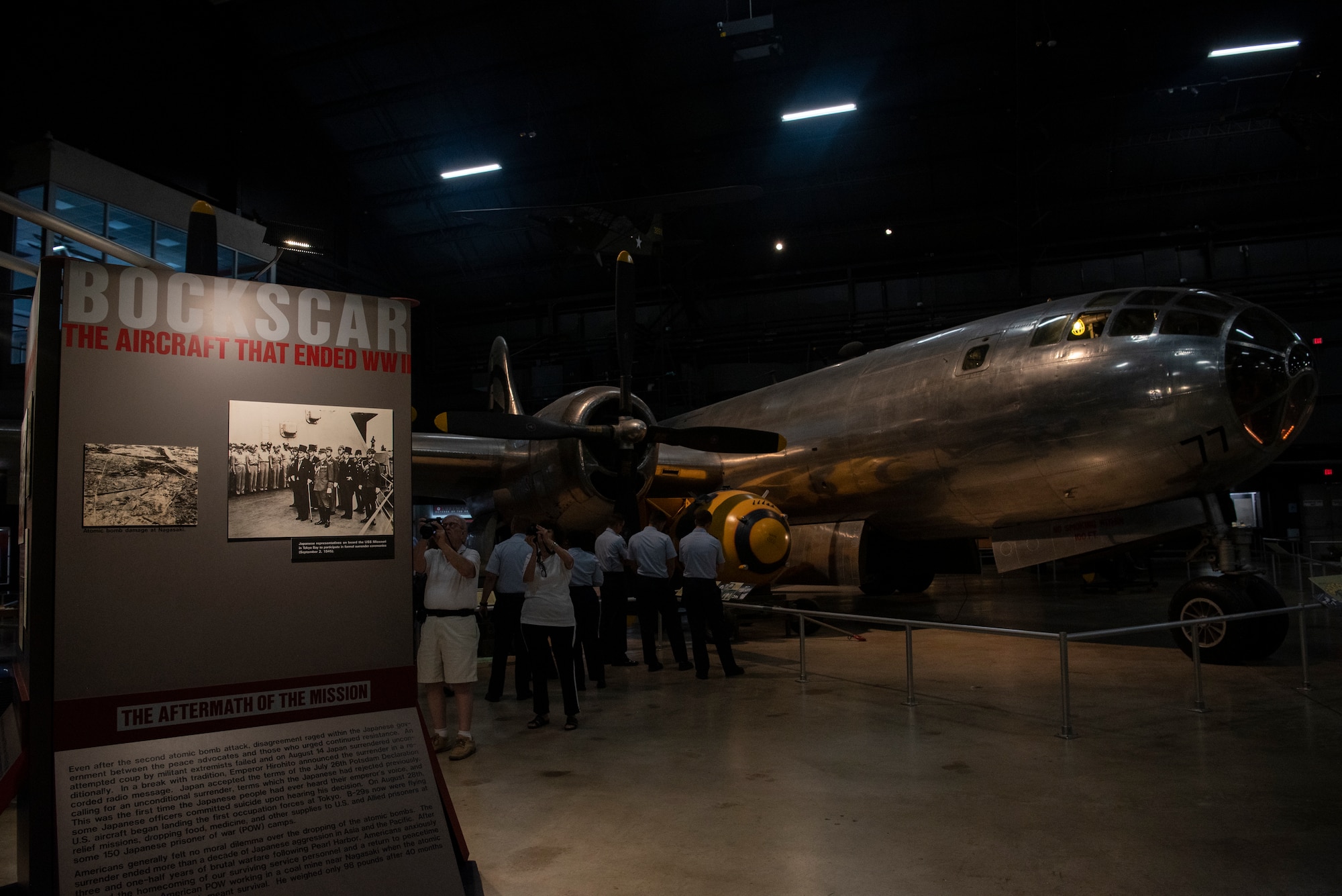 Airmen from the 90th Missile Wing views the B-29 Superfortress "Bockscar" exhibit within the National Museum of the U.S. Air Force Sept. 4, 2019, at Wright-Patterson Air Force Base, Ohio. Bockscar was the plane that dropped the atomic bomb on Nagasaki. (U.S. Air Force photo by Senior Airman Abbigayle Williams)