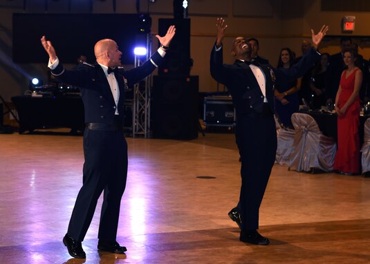 U.S. Air Force Col. Andres Nazario, 17th Training Wing commander, and Chief Master Sgt. Lavor Kirkpatrick, 17th Training Wing command chief, make an entrance at the 2019 Air Force Ball at the McNease Convention Center in San Angelo, Texas, September 7, 2019. The Air Force Ball’s theme was The Future of the Air Force. (U.S. Air Force photo by Airman 1st Class Ethan Sherwood/Released)