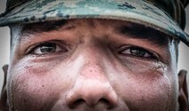 A recruit with Alpha Company, 1st Recruit Training Battalion, prepares to receive his Eagle, Globe, and Anchor, after the Crucible at Marine Corps Base Camp Pendleton, California Aug. 29.