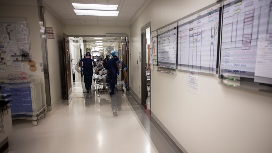 Retired U.S. Army Capt. Katie Blanchard is wheeled out of an operating room after surgery Sept. 6, 2019 at Wilford Hall Ambulatory Surgical Center, Joint Base San Antonio-Lackland, Texas.