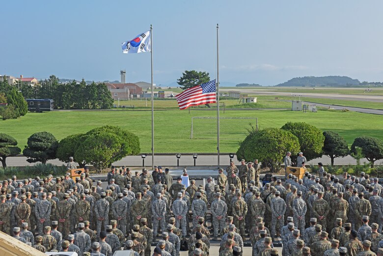 Members of the 8th Fighter Wing prepare for the September 11 Remembrance ceremony at Kunsan Air Base, Republic of Korea, Sept. 11, 2019. The ceremony was held in remembrance of the 2,977 people who lost their lives on Sept. 11, 2001, in New York City, Washington, D.C., and outside Shanksville, Pennsylvania. (U.S. Air Force photo by Staff Sgt. Mackenzie Mendez)