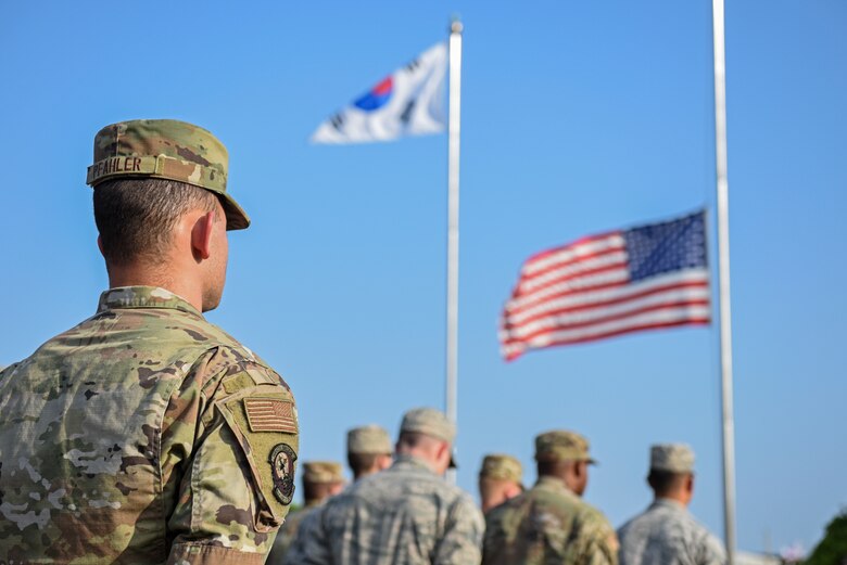 Airman 1st Class Rodney Pfahler, 8th Logistics Readiness Squadron member, stands at parade rest during the September 11 Remembrance ceremony at Kunsan Air Base, Republic of Korea, Sept. 11, 2019. The ceremony was held in remembrance of the 2,977 people who lost their lives on Sept. 11, 2001. (U.S. Air Force photo by Staff Sgt. Mackenzie Mendez)
