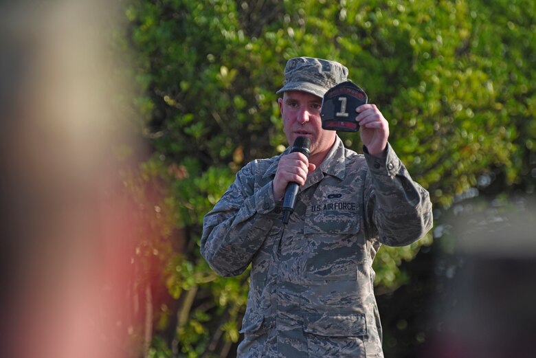 Airman 1st Class William Lemon, 8th Aircraft Maintenance Squadron member, talks about the morning of Sept. 11, 2001, and his duty as a volunteer firefighter to respond to the attacks in New York City during the September 11 Remembrance ceremony at Kunsan Air Base, Republic of Korea, Sept. 11, 2019. Lemon was a member of the Brentwood Fire Department for nearly 20 years and was one of the first responders called to duty 18 years ago on Sept. 11, 2001, before enlisting in the Air Force in 2017. (U.S. Air Force photo by Staff Sgt. Mackenzie Mendez)