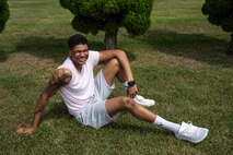 U.S. Air Force Airman 1st Class D’Andre Daniels, a 35th Aircraft Maintenance Squadron crew chief, poses for a photo at Misawa Air Base, Japan, Aug. 8, 2019. Daniels went to his fifth session in August to finish a meaningful piece on his arm. This one piece was a mesh of designs, representing two different times in his life. (U.S. Air Force photo by Airman 1st China M. Shock)