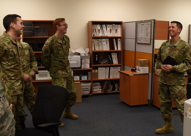 (Right) U.S. Air Force Master Sgt. James Drybola, 8th Communications Squadron first sergeant, checks in with his Airmen to talk about morale, quality-of-life and more at Kunsan Air Base, Republic of Korea, Sep. 10, 2019. The positon of first sergeant is occupied by senior non-commissioned officers after completing the four-week First Sergeant Academy at Maxwell-Gunter AFB, Alabama. (U.S. Air Force photo by Staff Sgt. Joshua Edwards)