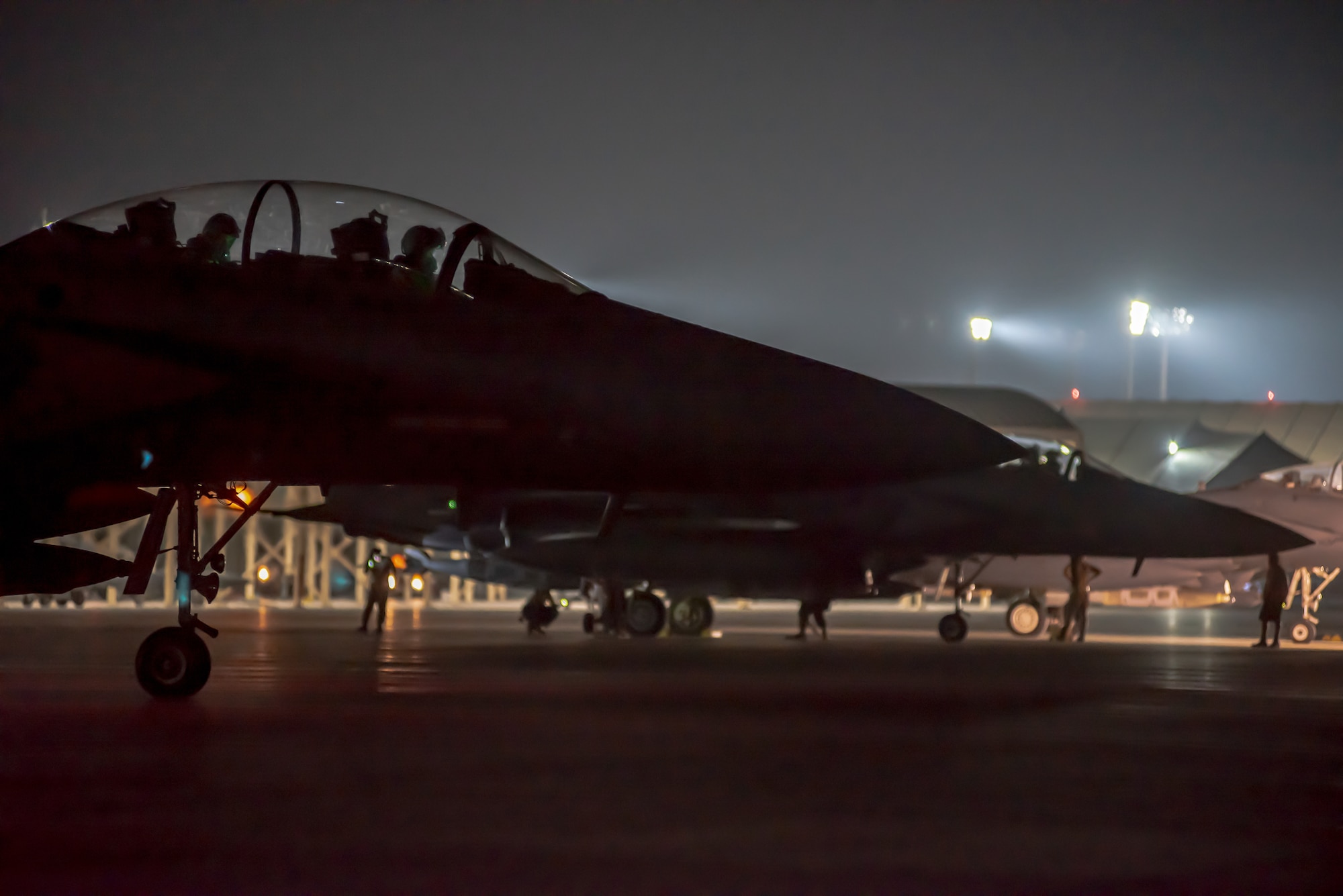 An F-15E Strike Eagles prepares to taxi the runway for takeoff from Al Dhafra Air Base, United Arab Emirates, Sept. 10, 2019. The F-15E conducted a Coalition and Iraqi Counter-Terrorism Service air strike in the Salah ad Din Province, Iraq, Sept. 10, in support of Iraqi ground force clearing operations.  (U.S. Air Force Photo by Staff Sgt. Chris Thornbury)