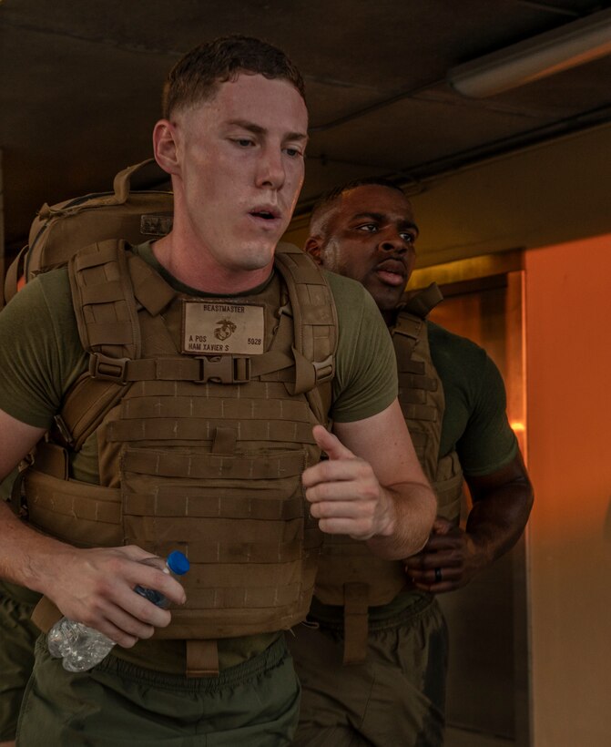 U.S. Marine Corps Sgt. Xavier S. Ham, a motor transport technician with Headquarters Battalion, Marine Forces Reserve, ascends a flight of stairs as part of a Total Force Fitness event at Marine Corps Support Facility New Orleans, Sept. 11, 2019. This was part of a MARFORRES Total Force Fitness event inspired by the 18th anniversary of 9/11 and the efforts of the first responders at the World Trade Center. The exercise consisted of Marines ascending and descending a five story stairwell 11 times, resulting in a total of 110 stories, which is equivalent to the height of the World Trade Center. (U.S. Marine Corps photo by Pfc. Leslie Alcaraz)