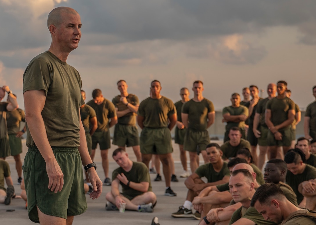 U.S. Marine Corps Col. Torrens Miller, commanding officer with Headquarters Battalion, Marine Forces Reserve, gives a speech after a Total Force Fitness event at Marine Corps Support Facility New Orleans, Sept. 11, 2019. During his speech, Miller spoke about the tragedy of 9/11 and encouraged the Marines to reflect on why they serve. This was part of a MARFORRES Total Force Fitness event inspired by the 18th anniversary of 9/11 and the efforts of the first responders at the World Trade Center. The exercise consisted of Marines ascending and descending a five story stairwell 11 times, resulting in a total of 110 stories, which is equivalent to the height of the World Trade Center. (U.S. Marine Corps photo by Pfc. Leslie Alcaraz)