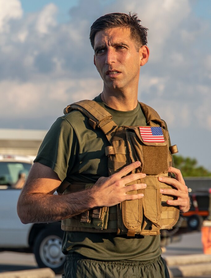 U.S. Marine Corps Maj. Erme I. Albayrak, operations officer, with Headquarters Battalion, Marine Forces Reserve, finishes a Total Force Fitness event at Marine Corps Support Facility New Orleans, Sept. 11, 2019. This was part of a MARFORRES Total Force Fitness event inspired by the 18th anniversary of 9/11 and the efforts of the first responders at the World Trade Center. The exercise consisted of Marines ascending and descending a five story stairwell 11 times, resulting in a total of 110 stories, which is equivalent to the height of the World Trade Center. (U.S. Marine Corps photo by Pfc. Leslie Alcaraz)