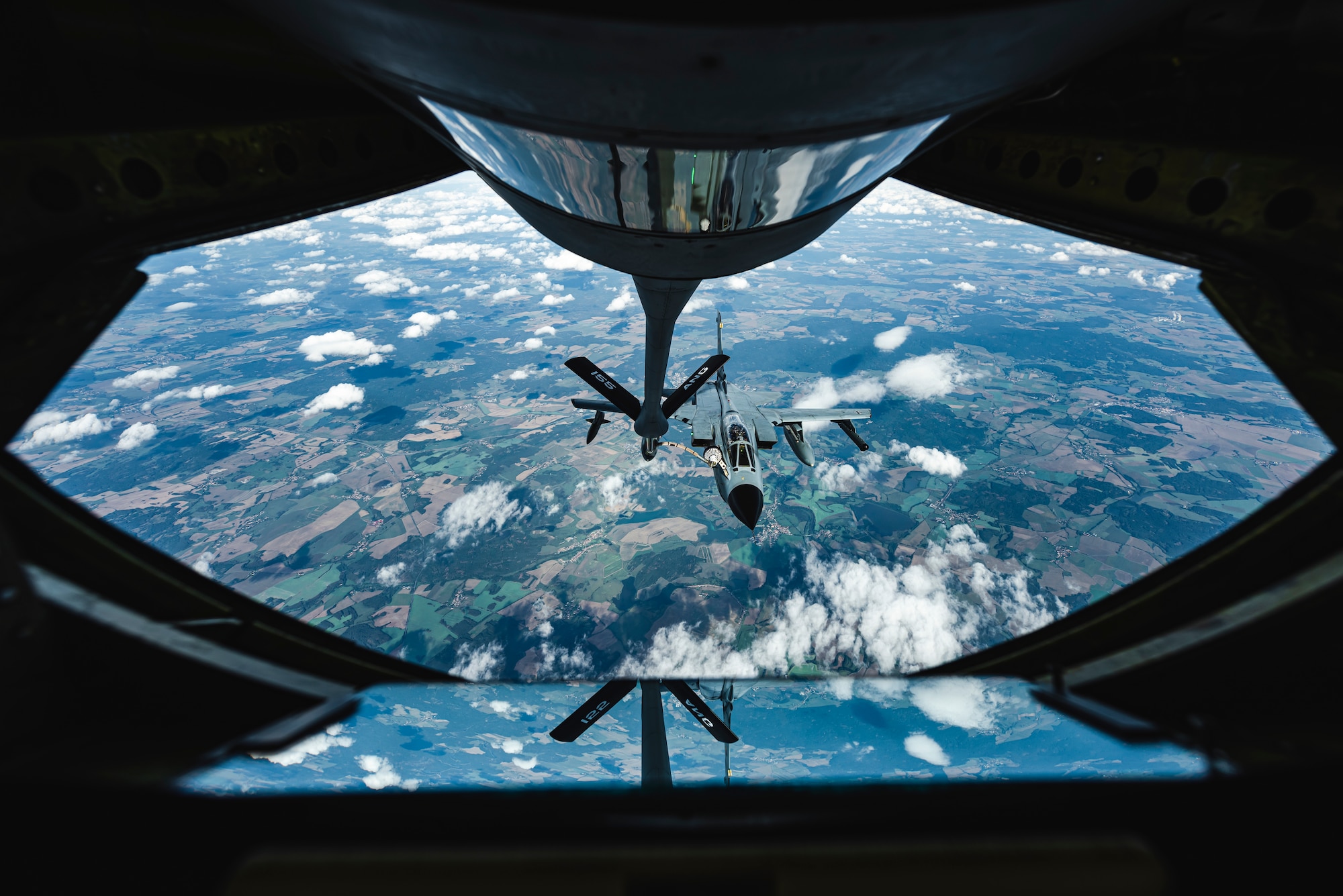 A German air force PA-200 Tornado conducts aerial refueling from a U.S. Air Force KC-135 Stratotanker.
