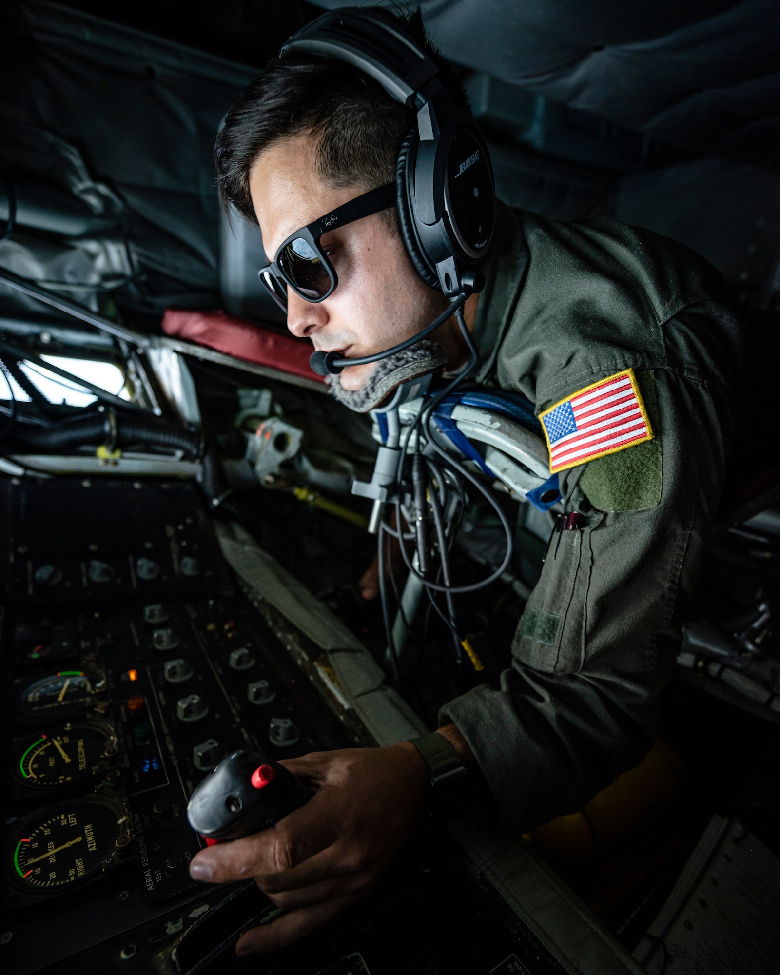 U.S. Air National Guard Senior Airman Dmitri Davila, 155th Air Refueling Wing in-flight refueling technician, operates the boom during an in-flight refuel of a German air force PA-200 Tornado during exercise Ample Strike 2019.