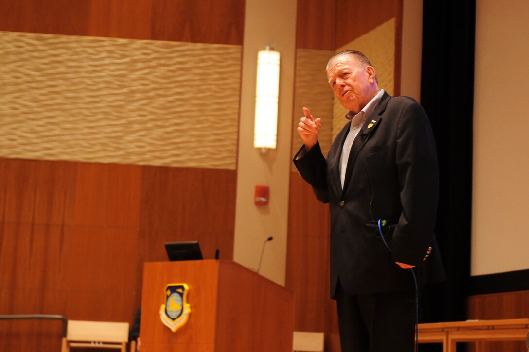 War correspondent and author Joseph Galloway speaks to the National Air and Space Intelligence Center Aug. 27 about the experiences described in his book “We Were Soldiers Once…and Young.” The book – which Galloway co-wrote alongside Lt. Gen. Harold Moore – tells the story of the Battle of the Ia Drang and went on to inspire the movie “We Were Soldiers.” (U.S. Air Force photo by Senior Airman Michael Hunsaker)