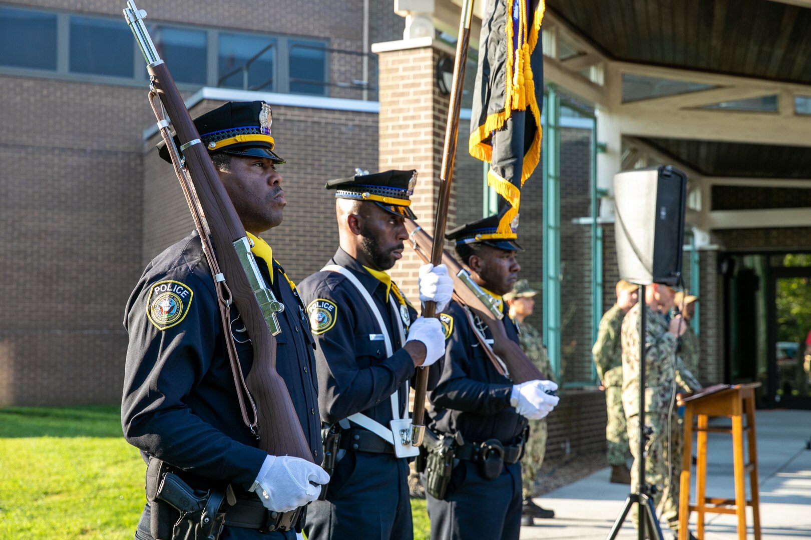 The Norfolk Naval Shipyard Police Color Guard stands ready to honor the fallen on Patriots Day Sept. 11.