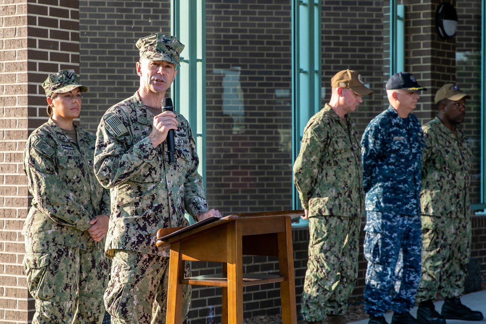 Norfolk Naval Shipyard Commander, Capt. Kai Torkelson, honors the fallen during a Patriots Day Remembrance Ceremony at America's Shipyard Sept. 11.