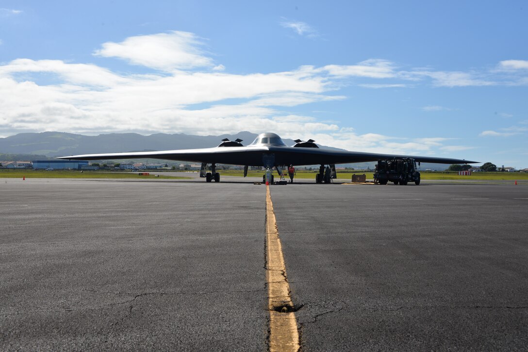A B2 Spirit Bomber waits to complete a hot pit refueling mission at Lajes Field, Azores, Portugal. These bomber missions represent the U.S. commitment to our allies and enhance regional security.