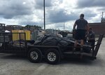 Horry County Police officers secure load the tents they obtained from DLA Disposition Services for hurricane preparations before heading back to South Carolina.