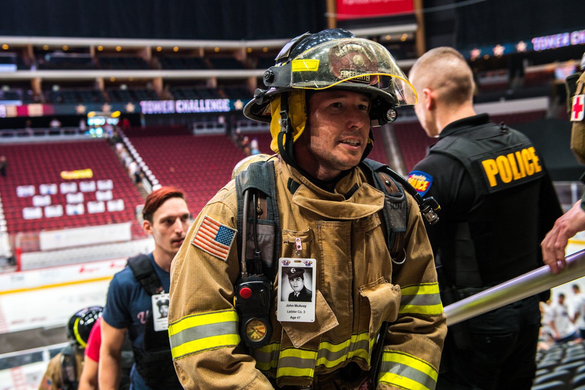 A firefighter from the Casa Grande Fire Department climbs stairs during the 9/11 Tower Challenge Sept. 11, 2019, at the Gila River Arena, Glendale, Ariz.