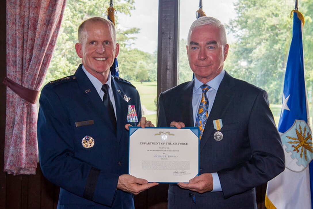 Air Force Vice Chief of Staff Gen. Stephen W. Wilson presides over a retirement ceremony in honor of Mike Thomas, the Joint Base Andrews golf course general manager, at JB Andrews, Md., July 12, 2019. (U.S. Air Force photo by Adrian Cadiz)