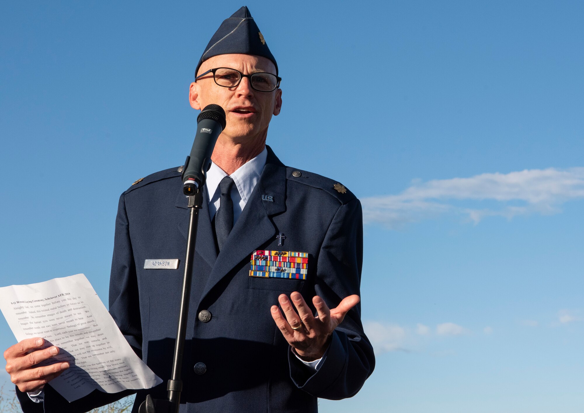 Maj. Martin Adamson, 50th Space Wing chaplain, gives an invocation during a wreath-laying ceremony at Schriever Air Force Base, Colorado, Sept. 11, 2019.  Despite the attacks on Sept. 11, 2001, America remains strong. (U.S. Air Force photo by Airman 1st Class Jonathan Whitely)