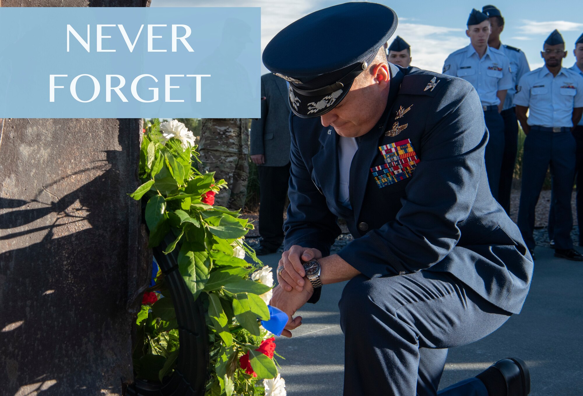Col. Jack Fischer, 50th Space Wing vice commander, lays a wreath at the base of an artifact from the World Trade Center Towers at Schriever Air Force Base, Colorado, in remembrance of those affected by the attacks on Sept. 11, 2001. Wing leadership, Airmen and the base chaplain were present at the ceremony. (U.S. Air Force illustration by Airman 1st Class Jonathan Whitely)
