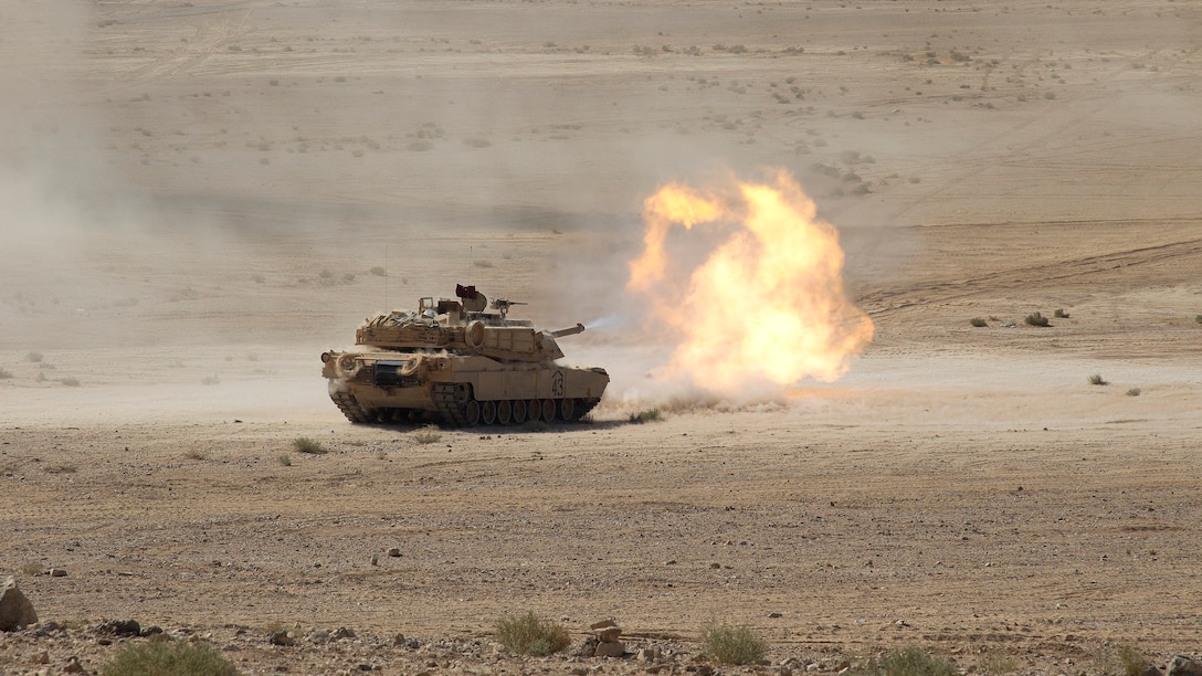 An M1A2 Abrams main battle tank from the 3rd Armored Brigade Combat Team, 4th Infantry Division, fires its 120mm gun downrange during a coalition combined arms live fire exercise, part of Eager Lion 2019, in Jordan, Sept. 5, 2019. The CALFEX was the culminating event of the multinational exercise, which saw up to 30 different countries participating in allied training scenarios that improved their collective ability to plan and operate in a coalition-type environment. In its ninth year, Eager Lion is U.S. Central Command’s premiere exercise in the Levant region. (U.S. Army photo by Sgt. 1st Class Darron Salzer, Task Force Spartan)