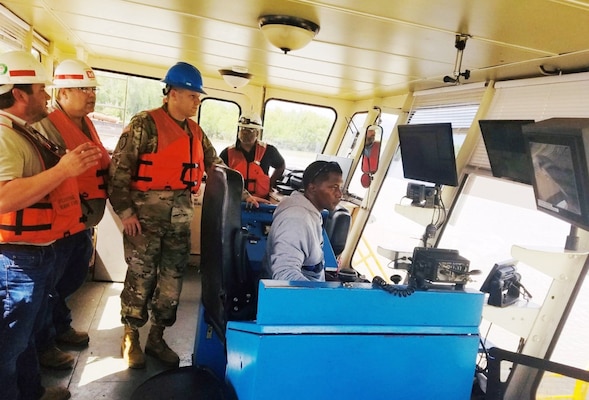 Memphis District Commander Col. Zachary Miller gets a firsthand look at how we use cutterhead dredges to keep river harbors open for business.