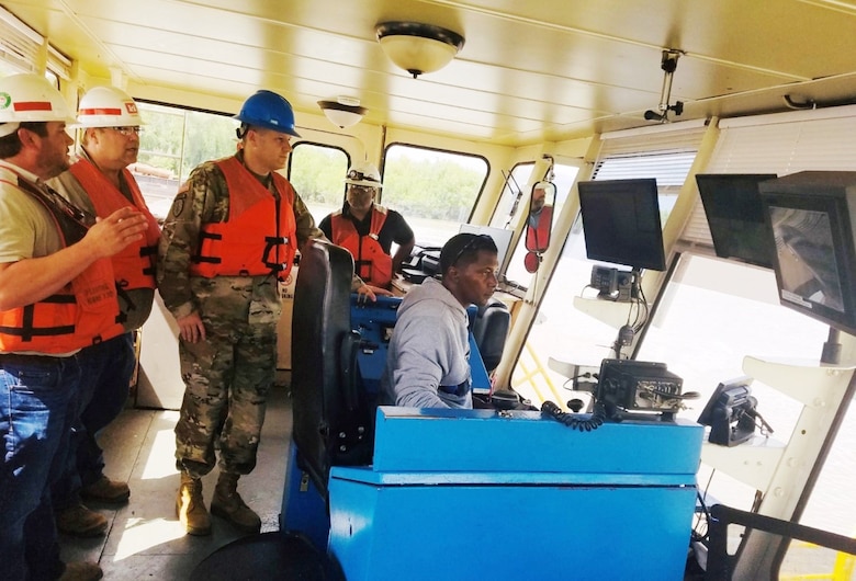 Memphis District Commander Col. Zachary Miller gets a firsthand look at how we use cutterhead dredges to keep river harbors open for business.