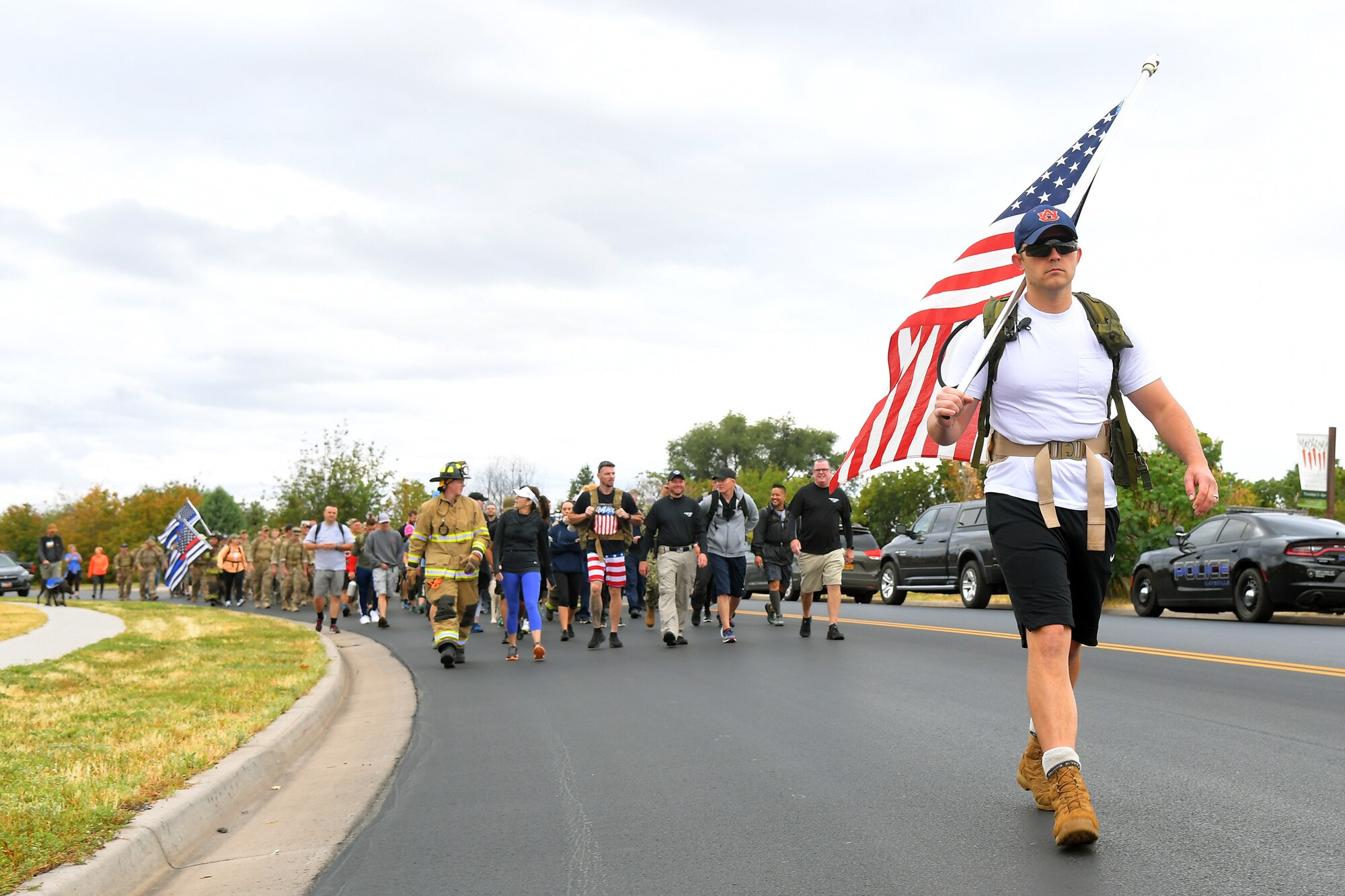 First Lt. John Gandy, Air Force Life Cycle Management Center, leads participants during the 9/11 Memorial Ruck March, in Kaysville, Utah, Sept. 11, 2019. The event was co-sponsored by Hill Air Force Base first responders and fire and police departments from Kaysville and Layton, to honor and remember the fallen from the events of Sept. 11, 2001. (U.S. Air Force photo by Todd Cromar)