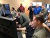 Members of the Military Affairs Committee visited Airmen at Creech Air Force Base, Nevada. August 28, 2019. During their tour, the members visited Airmen around base at the flight simulators, MQ-9 Reaper display and mission brief. (U.S. Air Force photo by Senior Airman Haley Stevens)
