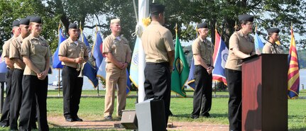 IMAGE: DAHLGREN. Va. (Sept. 11, 2019) – Navy chief select Emily Patch shares a story of heroism in response to the terrorist attacks and ensuing tragedies on 9/11. Patch was one of seven chief select ‘heroism readers’ based at commands located on Naval Surface Facility Dahlgren who recounted acts of heroism on that tragic day in our nation’s history.

Patch – reading to military, first responders, government and contractor personnel gathered to honor the victims of 9/11 – recounted that:
“When the Pentagon was hit by American Airlines Flight 77, Army Spc. Beau Doboszenski was working as a tour guide. After a Navy captain inquired if anyone had medical training, Doboszenski sprung into action. He was a former firefighter and had been trained as an EMT. He ran into the building, past barricades and police. Doboszenski gave first aid to victims and afterward, was part of a team that went back in to look for any survivors despite the building still being in flames.”