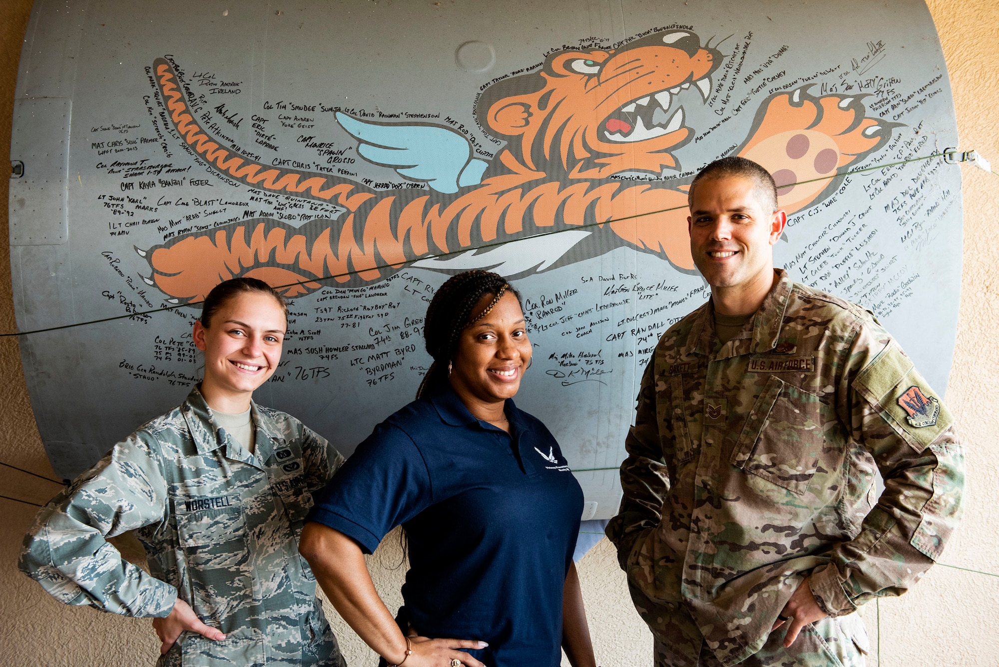 Tech. Sgt. Cole Barkett, right, 23d Maintenance Squadron fuel systems NCO in charge, Tech. Sgt. Turquoise Williams, center, 74th Fighter Squadron flight chief, and Airman Bailey Worstell, 23d Civil Engineer Squadron logistics apprentice, pose for a photo Sept. 10, 2019, at Moody Air Force Base, Ga. All three Airmen shared stories at Moody’s first ever “Owning Your Story” seminar which took place Sept. 12, 2019. During the event, Airmen shared stories of resiliency and how they overcame their adversity in a positive way. (U.S. Air Force photo by Senior Airman Erick Requadt)