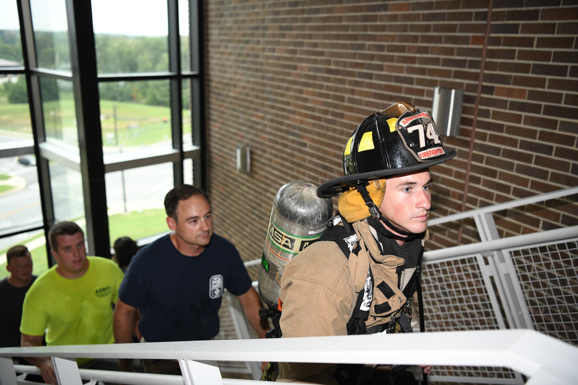 11th Mission Support Group Airmen climb stairs on Joint Base Andrews, Md., Sept. 9, 2019. Participants climbed up and down stairs on base to commemorate the number of stairs first responders had to climb in the World Trade Center towers during the 9/11 attacks in 2001. (U.S. Air Force photo by Airman 1st Class Spencer J. Slocum)