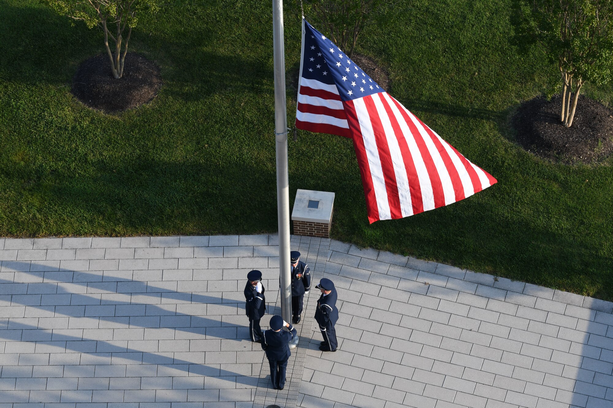 Members of the U.S. Air Force Honor Guard lower the flag to half-staff during the 9/11 memorial ceremony on Joint Base Andrews, Md., Sept. 11, 2019. Nearly 3,000 people lost their lives in the terrorist attack on Sept. 11, 2001 (U.S. Air Force photo by A1C Spencer J. Slocum)