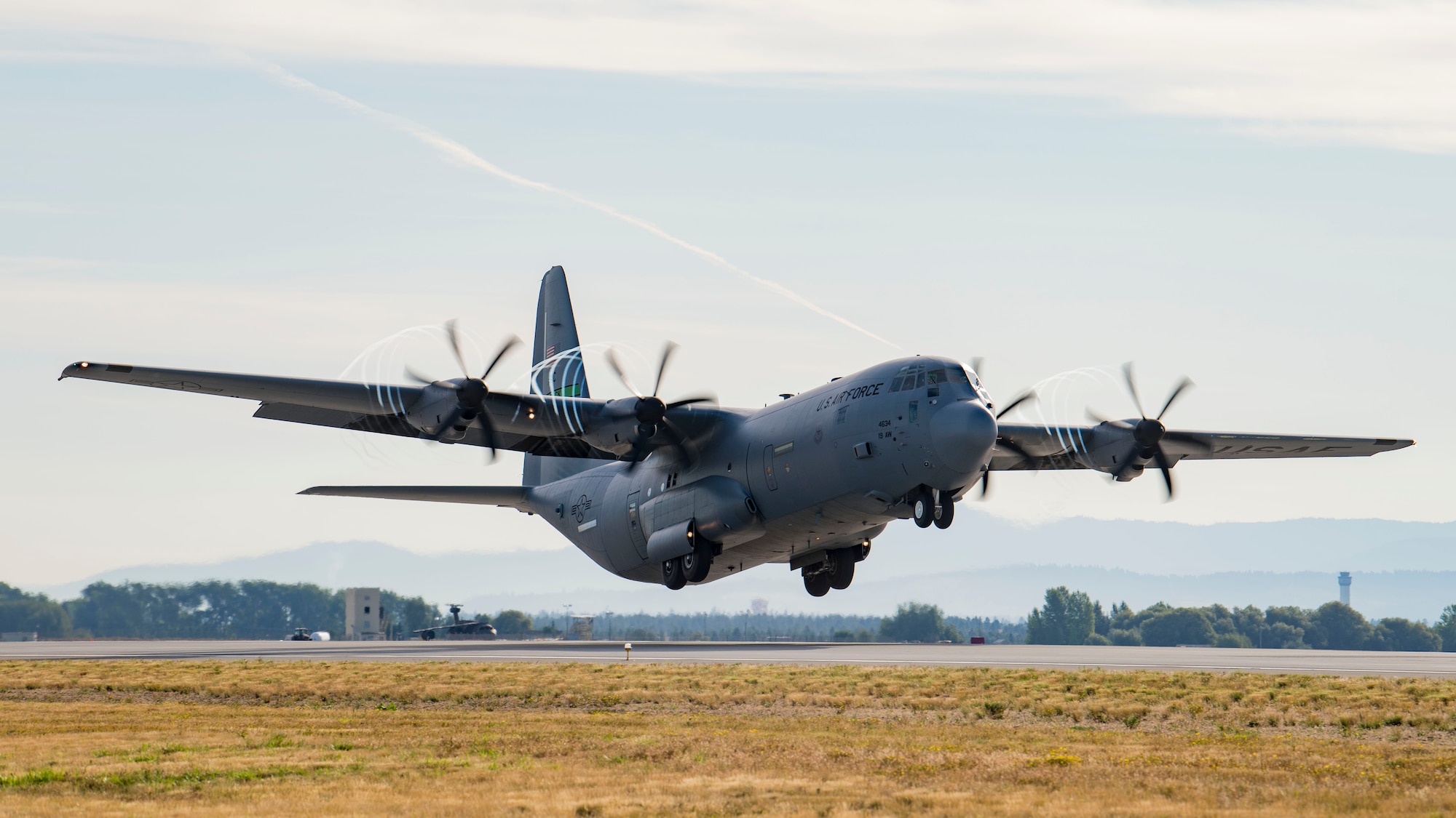 A U.S. Air Force C-130J Hercules from Little Rock Air Force Base, Arkansas, takes off during exercise Mobility Guardian 2019 at Fairchild Air Force Base, Washington, Sept. 12, 2019. Through robust and relevant training, Mobility Guardian is designed to build full spectrum readiness and develop Mobility Airmen to ensure the delivery of Rapid Global Mobility now and in the future. (U.S. Air Force photo by Airman 1st Class Lawrence Sena)